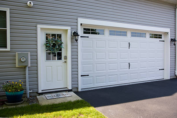 24/7 Emergency Garage Door Panel Replacement experts in Kenly, NC